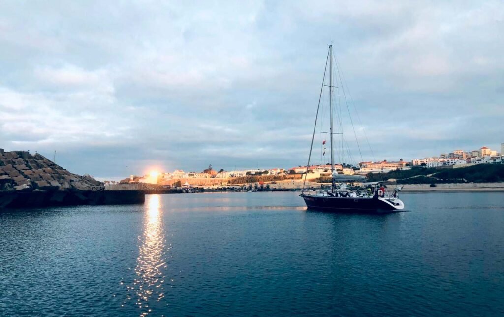 Balaya sailing on the calm waters of the Tagus River at sunset